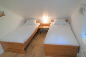 Postel nebo postele na pokoji v ubytování Meerpaal, Spaanse Galeien 65 Cadzand