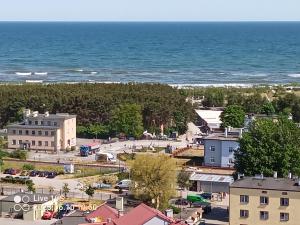 an aerial view of a town and the ocean at Zielony Port numer 3 in Władysławowo