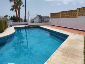 Bazén v ubytování Nerja Sun Apartments Casa Cipreses 5 nebo v jeho okolí