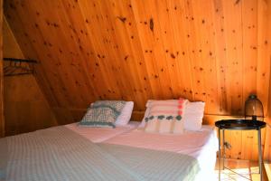 Postel nebo postele na pokoji v ubytování El Chalet de Ger, cálida casa alpina en la Cerdanya