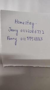 a piece of paper with handwriting on the side of it at Gopeng Senada Holiday House in Gopeng