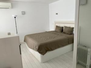 Posteľ alebo postele v izbe v ubytovaní Edificio Playa Mar