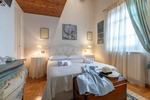 Ένα ή περισσότερα κρεβάτια σε δωμάτιο στο Tuscany Balcony: Crete Senesi