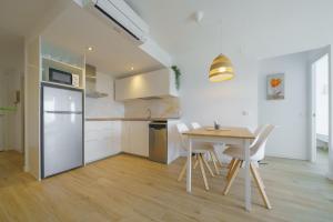 Kuchyň nebo kuchyňský kout v ubytování HomeHolidaysRentals Delmare - Costa Barcelona