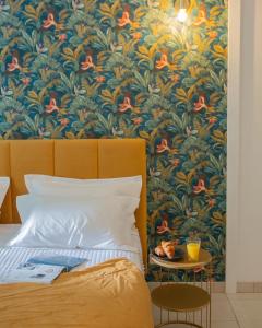 Een bed of bedden in een kamer bij Hôtel & Résidence San Roccu