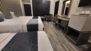 Φωτογραφία από το άλμπουμ του Hotel Akbar International σε Ραβαλπίντι +78 φωτογραφίες