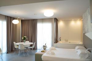 Posteľ alebo postele v izbe v ubytovaní Hotel Malavoglia