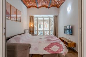 Ένα ή περισσότερα κρεβάτια σε δωμάτιο στο Royal Apartment