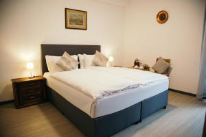 Postel nebo postele na pokoji v ubytování Al Pozz Boutique Resort