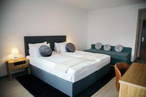 Postel nebo postele na pokoji v ubytování Al Pozz Boutique Resort