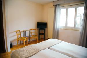 Postel nebo postele na pokoji v ubytování Al Pozz Boutique Resort