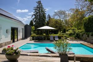 Bazén v ubytování B&B Tannerie nebo v jeho okolí