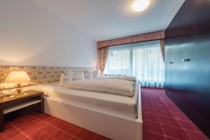 Posteľ alebo postele v izbe v ubytovaní Apartment Hotel Pfeifer