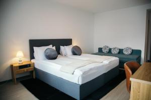 Postel nebo postele na pokoji v ubytování Al Pozz Boutique Resort