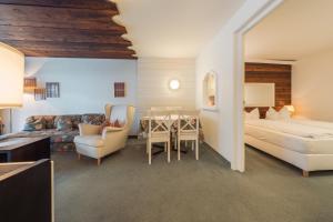Posteľ alebo postele v izbe v ubytovaní Apartment Hotel Pfeifer + 37 fotografií