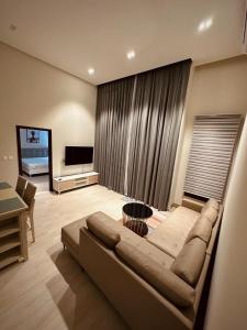 TV a/nebo společenská místnost v ubytování one bedroom villa