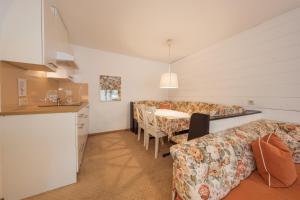 Kuchyňa alebo kuchynka v ubytovaní Apartment Hotel Pfeifer