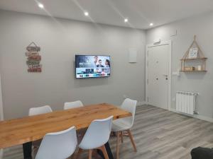 TV a/nebo společenská místnost v ubytování Precioso Piso Céntrico en Gijón- VUT 3958