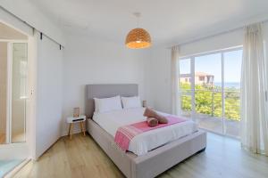 Postel nebo postele na pokoji v ubytování Ocean Villa - Pool & Fireplace + 25 fotografií