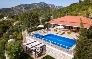 an aerial view of a house with a swimming pool at Zeytin Evi in Marmaris