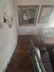 Posezení v ubytování WOODSTONE APARTMAN