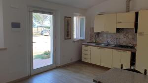 Køkken eller tekøkken på Agriturismo Podere Il Fitto