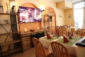 TV a/nebo společenská místnost v ubytování Al Pozz Boutique Resort