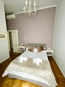 Posteľ alebo postele v izbe v ubytovaní B&B Dimora Sassetti 6