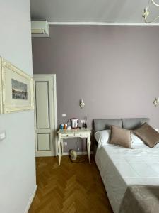Posteľ alebo postele v izbe v ubytovaní B&B Dimora Sassetti 6