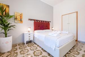 A bed or beds in a room at Villa Crigiada Luxury Pool