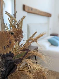 Postel nebo postele na pokoji v ubytování Arya Room Villasimius