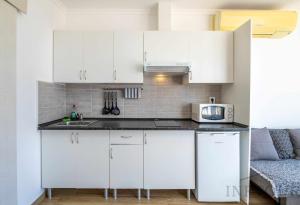 Kuchyňa alebo kuchynka v ubytovaní Inftour President 1 Apartamento + 17 fotografií