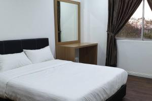 Postel nebo postele na pokoji v ubytování 2. Luxury Kristal Condo 2 丹绒亚路高級市中心住宅 + 17 fotografií