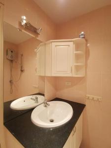 a bathroom with a white sink and a counter at Pool Villa 92 in Ban Nong Pru +6 photos