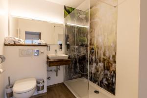Ein Badezimmer in der Unterkunft Gasthof zur Post Saulgrub