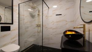 Koupelna v ubytování Apartament na Spokojnej + 10 fotografií