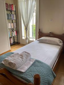 A bed or beds in a room at Anesa House
