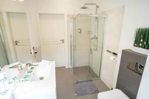 Koupelna v ubytování Palmowe Wzgórze Skoszewo - Luksusowe Apartamenty