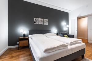 Posteľ alebo postele v izbe v ubytovaní Stylish apartment next to Schwedenplatz