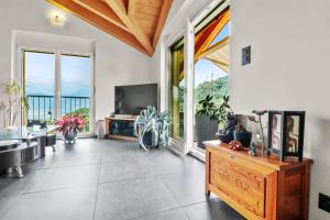 Posezení v ubytování Logement avec vue sur la plaine