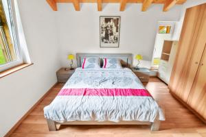 Logement avec vue sur la plaine 객실 침대