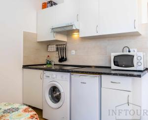 Kuchyňa alebo kuchynka v ubytovaní Inftour President 3 Apartamento