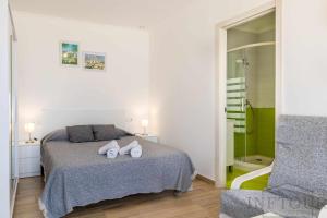Posteľ alebo postele v izbe v ubytovaní Inftour President 3 Apartamento