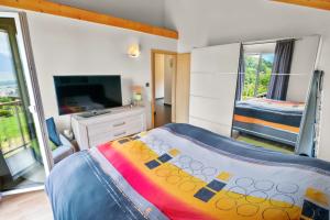 Logement avec vue sur la plaine 객실 침대