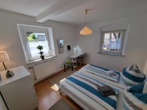 Postel nebo postele na pokoji v ubytování Ferienwohnung Dietel