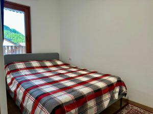 Posteľ alebo postele v izbe v ubytovaní D'Hérens apartment
