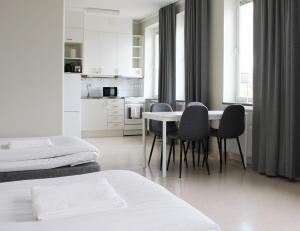 Postel nebo postele na pokoji v ubytování Sidsjö Hotell & Konferens