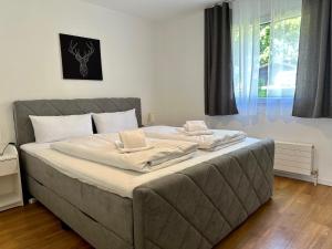 Кровать или кровати в номере Apartment BERGseetraum - Bergblick, neu renoviert, gemütlich, familienfreundlich