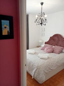 מיטה או מיטות בחדר ב-Coquetty Housing In Santander Bay