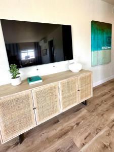 a bathroom with a large mirror on the wall at AZUL on Avenida Del Mar (1/2 Mile to the PIER!) in San Clemente